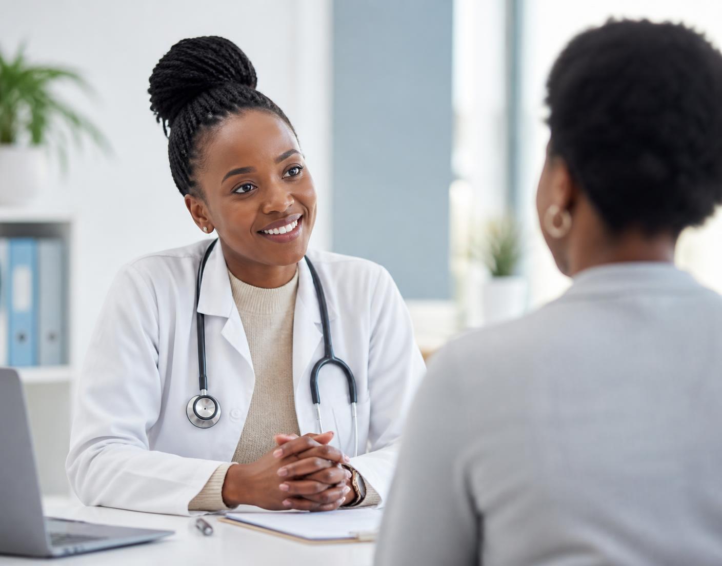 A doctor consulting with a patient at a RAJO+ clinic